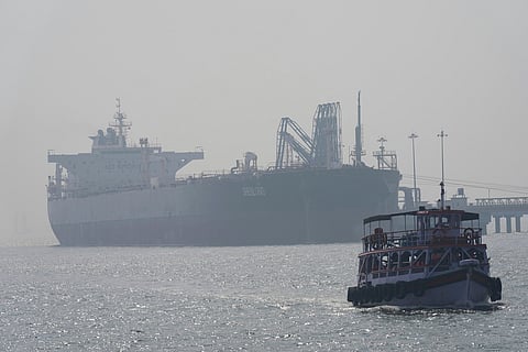 Liberia-flagged tanker Shenlong Suezmax, carrying crude oil from Saudi Arabia, that arrived clearing the Strait of Hormuz, is seen at the Mumbai Port in Mumbai, India, Thursday, March 12, 2026. 