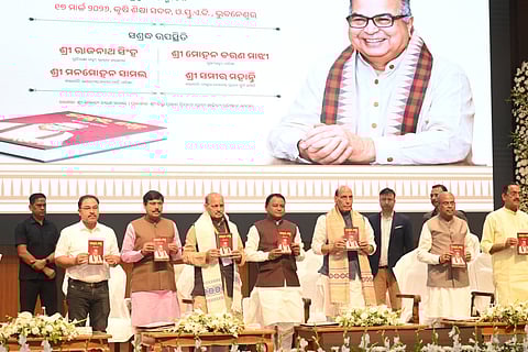 Defence minister Rajnath Singh releasing ‘Daktar Babu’, a book on Debendra Pradhan in presence of CM Mohan Majhi, Union minister Dhamendra Pradhan, state BJP president Manmohan Samal and others