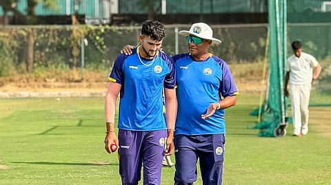 Pacer Ashok Sharma with coach Anshu Jain