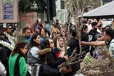 Iranians shop at the Tajrish Bazaar in northern Tehran on March 19, 2026, on the eve of Nowruz (Noruz), the Persian New Year.