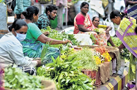 People buying Ugadi puja and pickle ingredients ahead of the festival in Vijayawada on Wednesday | Prasant Madugula
