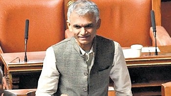 Revenue Minister Krishna Byre Gowda makes a point in the Assembly.