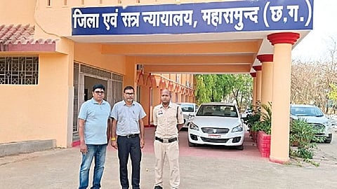 The accused, Brajesh Mishra (middle), along with EOW personnel.