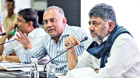 Deputy Chief Minister DK Shivakumar and Health Minister  Dinesh Gundu Rao at a meeting with city legislators on Friday