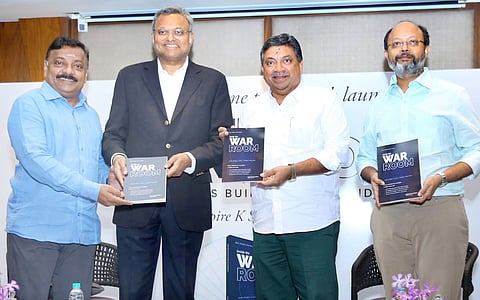 Former AIADMK functionary, entrepreneur and political consultant Aspire K Swaminathan, Congress MP Karthi P Chidambaram and  IT Minister Palanivel Thiaga Rajan at the release of the book "War Room", in Chennai.