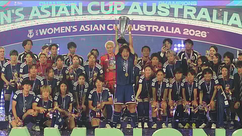 Japanese players celebrate after winning against Australia at the Women's Asian Cup soccer final in Sydney, Saturday, March 21, 2026.
