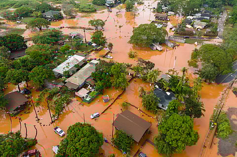 Fooding covers a residential neighborhood in Waialua, Hawaii, Friday, March 20, 2026. 