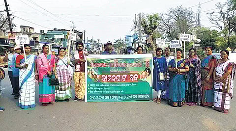 Agitators blocking a road during the bandh in Rairangpur on Friday | express