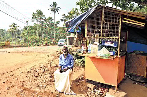 Gopalan sits outside his small roadside shop located at Valiyara in Thiruvananthapuram district.