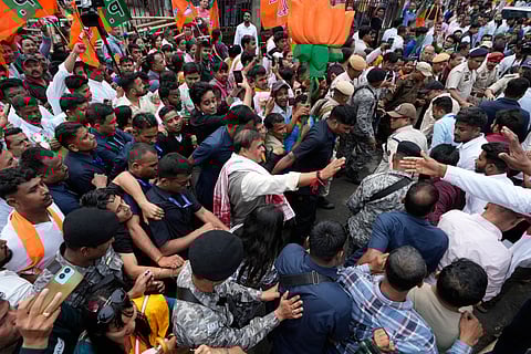 Assam chief minister Himanta Biswa Sarma, centre, candidate of Bharatiya Janata Party returns with supporters after filing his nomination for the Jalukbari constituency ahead of Assam State Assembly Election 2026 in Guwahati, India, Friday, March 20, 2026. 