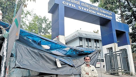 James protesting in front of the Wayanad civil station in Kalpetta.