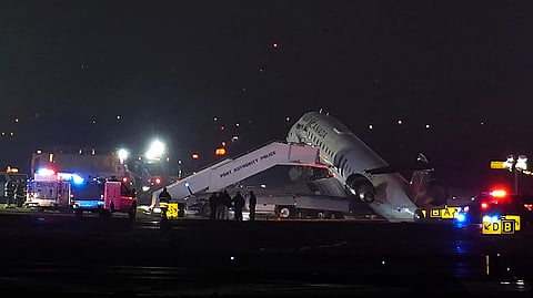An Air Canada Jet sits on the runway at LaGuardia Airport, Monday, March 23, 2026, after colliding with a Port Authority vehicle in New York.