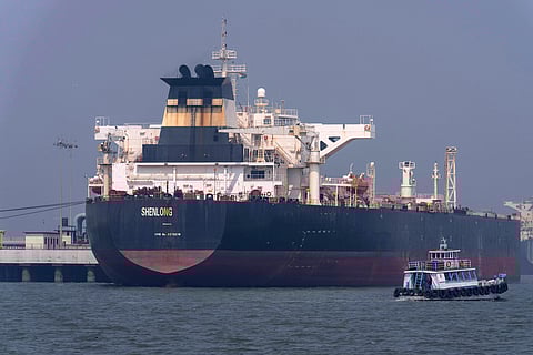 Liberia-flagged tanker Shenlong Suezmax, carrying crude oil from Saudi Arabia, that arrived clearing the Strait of Hormuz, is seen at the Mumbai Port in Mumbai, India, Thursday, March 12, 2026.