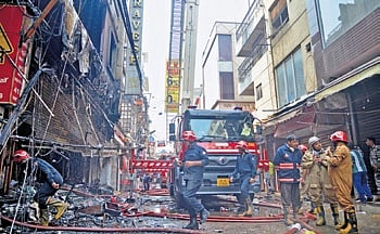 The initial fire report in the Palam incident states that only a single staircase, from ground to terrace floor, was present, which was not accessible from outside the building.