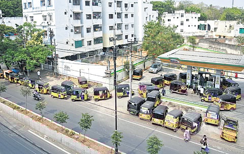 A large number of auto-rickshaws seen on the stretch leading to a refilling centre 
at Amberpet in Hyderabad on Monday.