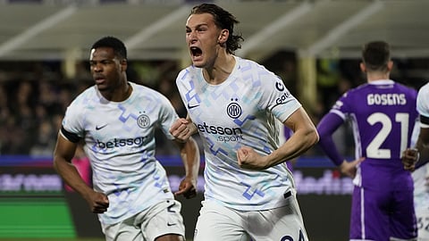 Inter's Pio Esposito celebrates after scoring the opening goal during the Serie A soccer match between Fiorentina and Inter Milan in Florence, Italy, Sunday, March 22, 2026.