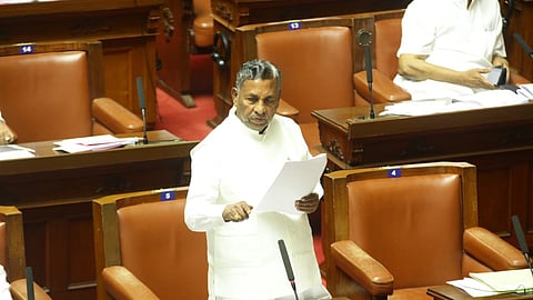 State Food and Civil Supplies Minister KH Muniyappa addresses the Legislative Council on Monday.