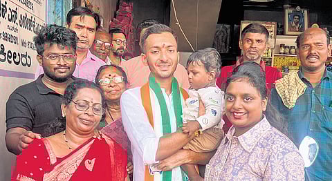 Congress candidate Samarth Shamanur campaigns in Davanagere on Tuesday.