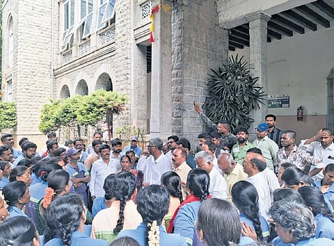 Pourakarmikas gather outside the GBA head office seeking immediate attention of Chief Commissioner M Maheshwar Rao.