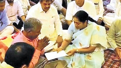 Chief Minister Rekha Gupta talking with the families of the victims on Tuesday.