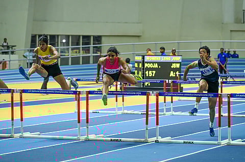 Athletes in action during the opening day of the National Indoor Athletics meet in Bhubaneswar