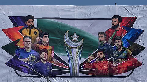 A billboard of Pakistan's premier domestic T20 the Pakistan Super League, which will take place in empty stadiums due to the recent spike in oil prices, is displayed at a road in Rawalpindi, Pakistan, Tuesday, March 24, 2026.
