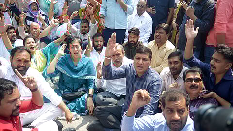 LoP Atishi protests in front of the Assembly