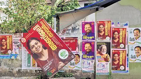Hoarding and posters of candidates in Tripunithura