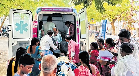 A patient is shifted into an ambulance at MGM Hospital to be taken to the Super Speciality Hospital in KMC