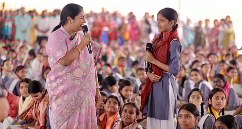 Delhi Chief Minister Rekha Gupta with students during 'Kanya Pujan' on the occasion of 'Durga Ashtami', at Sarvodaya Vidyalaya in Shalimar  Bagh, New Delhi on Thursday. 