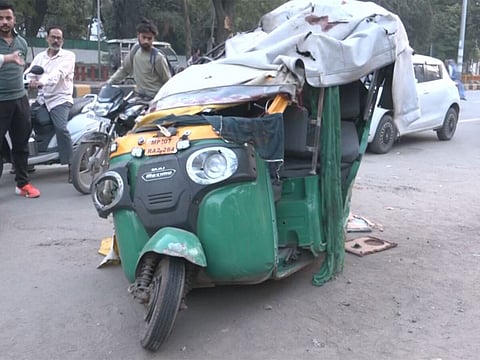 The collission impact pushed the autorickshaw against a neem tree, leaving it severely damaged