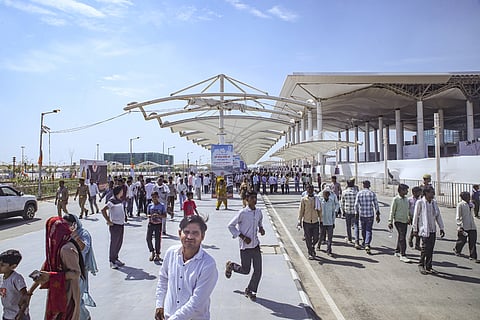 People gather at the newly constructed Noida International Airport, Jewar