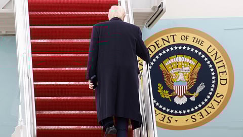 President Donald Trump walks up the stairs of Air Force One at Joint Base Andrews, Md., Friday, March 27, 2026. 