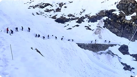 Rudraprayag administration clears snow to ensure the pedestrian path is safe for pilgrims.