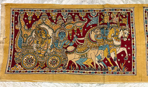 President of India Draupadi Murmu watching Srikalahasti Kalamkari Potrait Nandeshwar art at Rastrapati Bhavan, New Delhi. Artist M. Viswanath Reddy