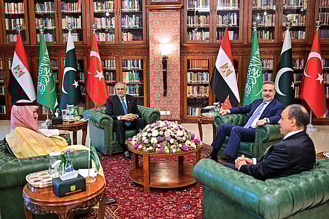 In this photo, released by the Pakistan Ministry of Foreign Affairs, from left, Saudi Arabia's Foreign Minister Prince Faisal bin Farhan Al-Saud, Pakistan's Foreign Minister Ishaq Dar, Turkish Foreign Minister Hakan Fidan and Egyptian Foreign Minister Badr Abdelatty attend a meeting to discuss Middle East war, in Islamabad, Pakistan, Sunday, March 29, 2026.