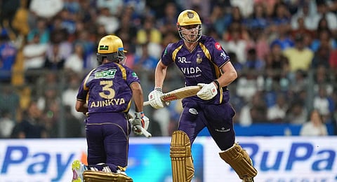 Kolkata Knight Riders' Cameron Green, right, and captain Ajinkya Rahane run between the wickets during the Indian Premier League cricket match between Mumbai Indians and Kolkata Knight Riders in Mumbai, India, Sunday, March 29, 2026. 