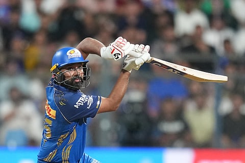 Mumbai Indians' Rohit Sharma plays a shot during the Indian Premier League match between Mumbai Indians and Kolkata Knight Riders in Mumbai.