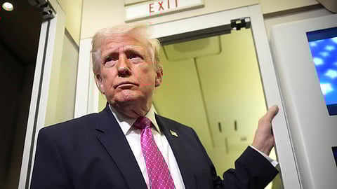 US President Donald Trump speaks to reporters aboard Air Force One en route from West Palm Beach, Fla., to Joint Base Andrews, Md., Sunday, March 29, 2026.