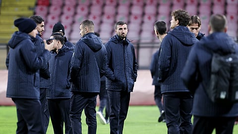 Italian players walk on the pitch ahead of Tuesday's World Cup playoff final soccer match against Bosnia at the Bilino Polje Stadium in Zenica, Bosnia, on Monday, March 30, 2026.