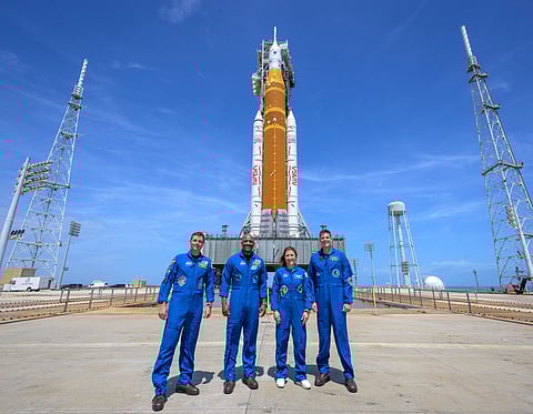 This photo provided by NASA shows NASA astronauts Reid Wiseman, Artemis II commander, from left, Victor Glover, Artemis II pilot, Christina Koch, Artemis II mission specialist, and CSA (Canadian Space Agency) astronaut Jeremy Hansen, Artemis II mission specialist, right, in a group photograph.