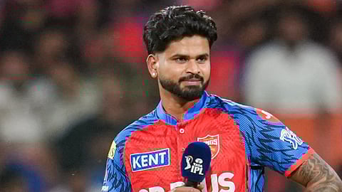 Punjab Kings' captain Shreyas Iyer during the toss before an Indian Premier League (IPL) 2026 T20 cricket match between Punjab Kings and Gujarat Titans, in Mullanpur, Tuesday, March 31, 2026.
