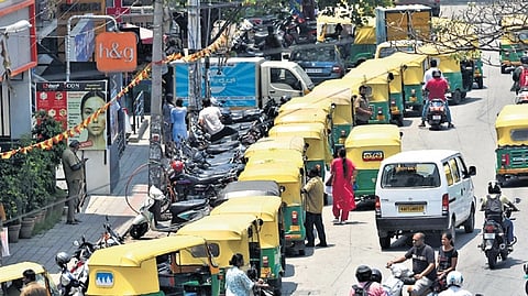 Autorickshaws line up at Bowring Service Station in Bengaluru.