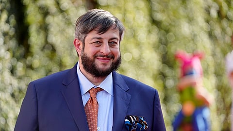 FILE - Eugene Mirman, a cast member in, "The Bob's Burgers Movie," poses at the premiere of the film, May 17, 2022, at the El Capitan Theatre in Los Angeles.