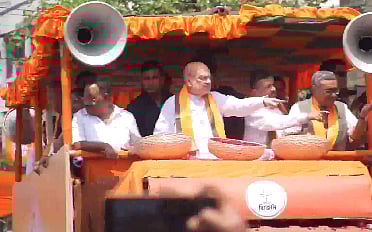 Union Home mInister Amit Shah with Bengal LoP Suvendu Adhikari after the latter filed his nomination from Bhabanipur.