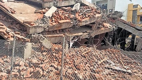 The debris from the demolition lies on the site, in Hyderabad on Wednesday