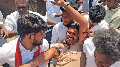During the Vijay's campaign, a police constable S Sathishkumar was injured after being pushed by TVK cadres and struck by the car belonging to the party’s senior leader.