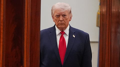 President Donald Trump arrives from the Blue Room to speak about the Iran war from the Cross Hall of the White House on Wednesday, April 1, 2026, in Washington
