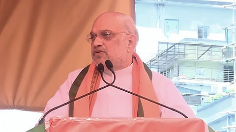 Union Home Minister Amit Shah speaking at an election rally at Hazra Crossing in Kolkata.