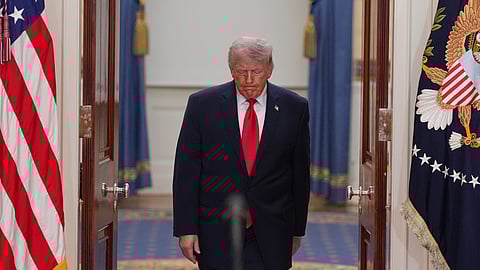 US President Donald Trump arrives to speak about the Iran war from the Cross Hall of the White House on Wednesday, April 1, 2026, in Washington.
